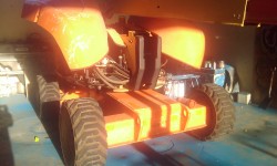 JLG 600AJ Boom Lift in workshop before repaint