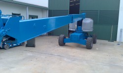 Genie S45 boom lift after painting in blue